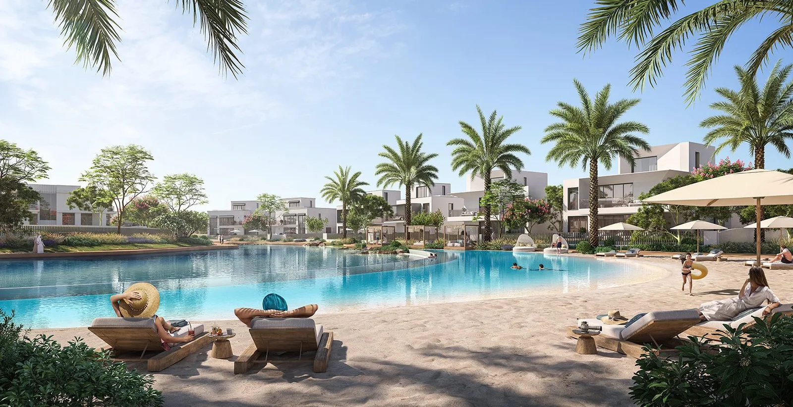 The Oasis community lagoon and beach beside villas — official rendering