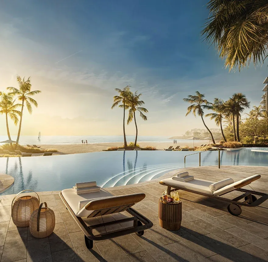 Solaya: Beachside pool and sun loungers at sunset; official developer rendering