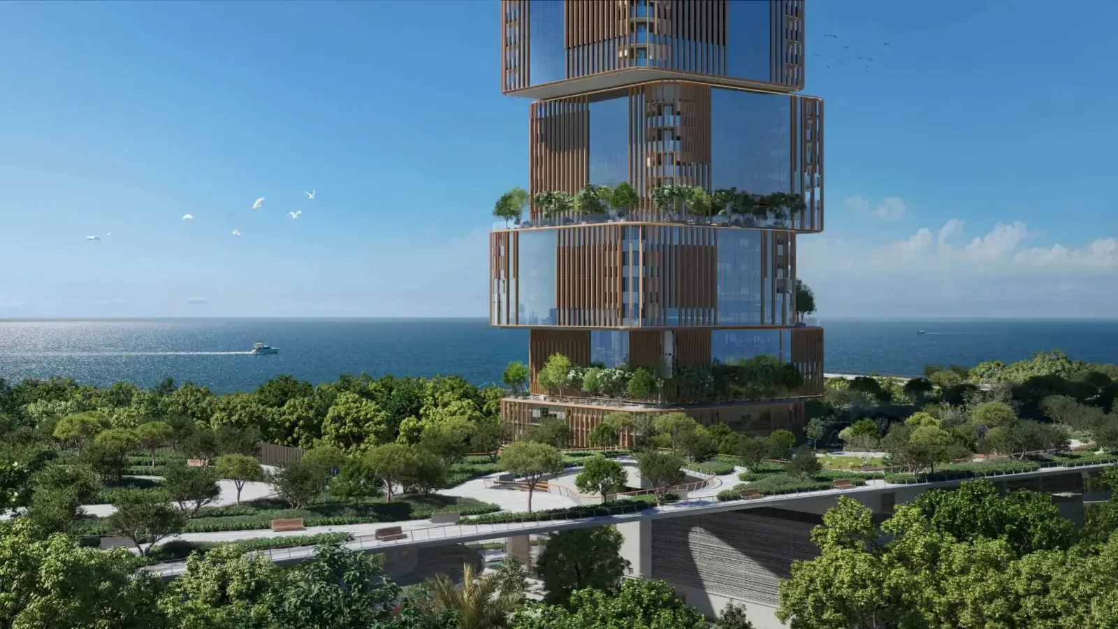 31 Above: Tower facade and landscaped podium facing the sea; official developer rendering