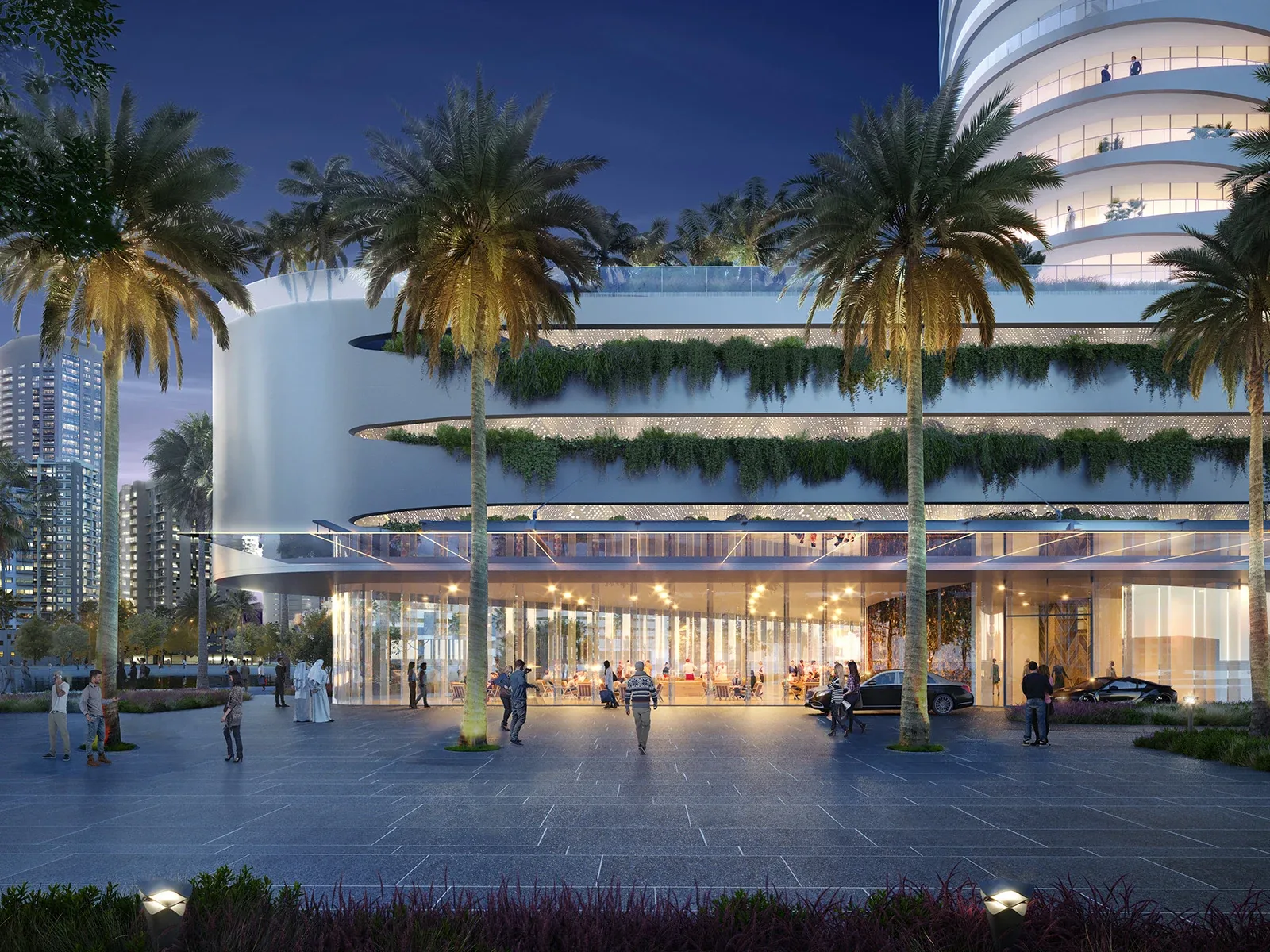 Canal Heights by de GRISOGONO: Illuminated entrance and landscaped podium with palm trees; official developer rendering