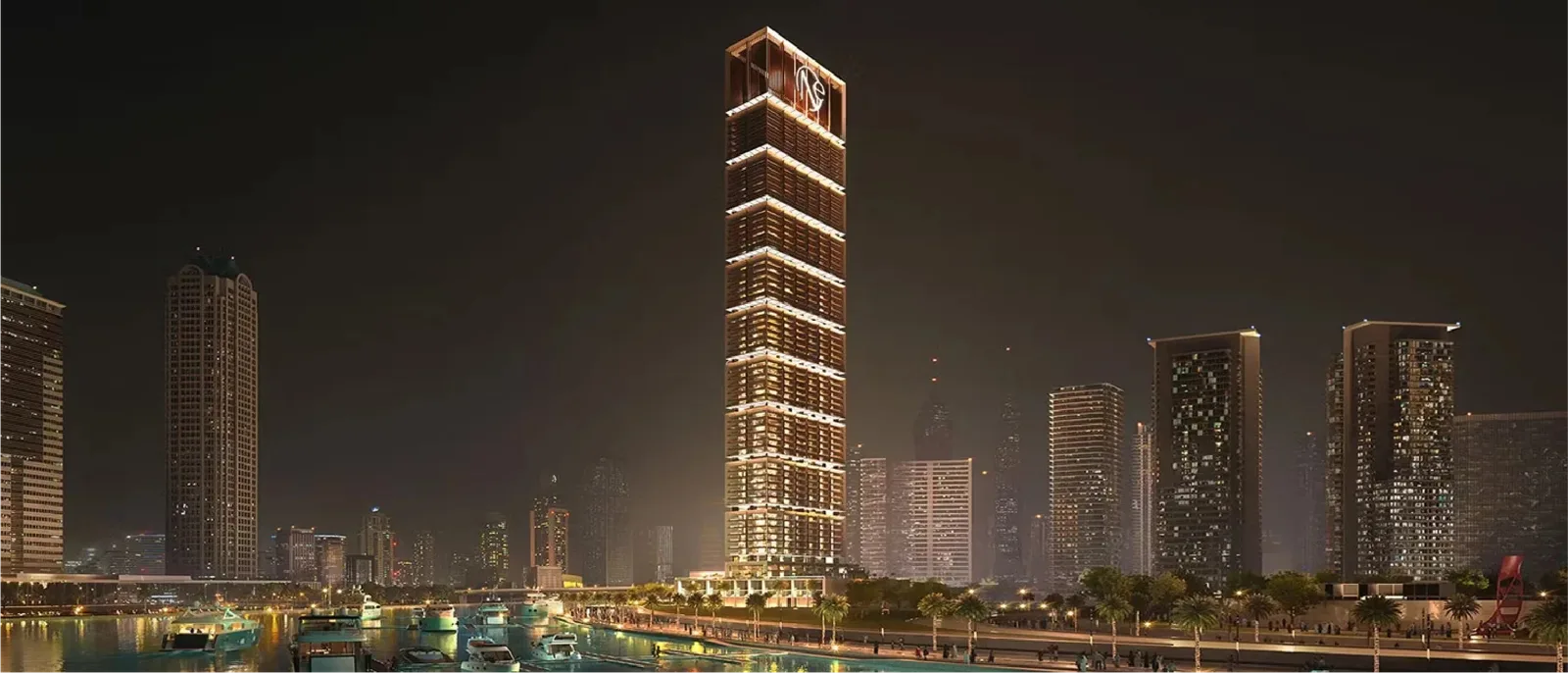 ONE by Binghatti: illuminated residential tower at night — rendering