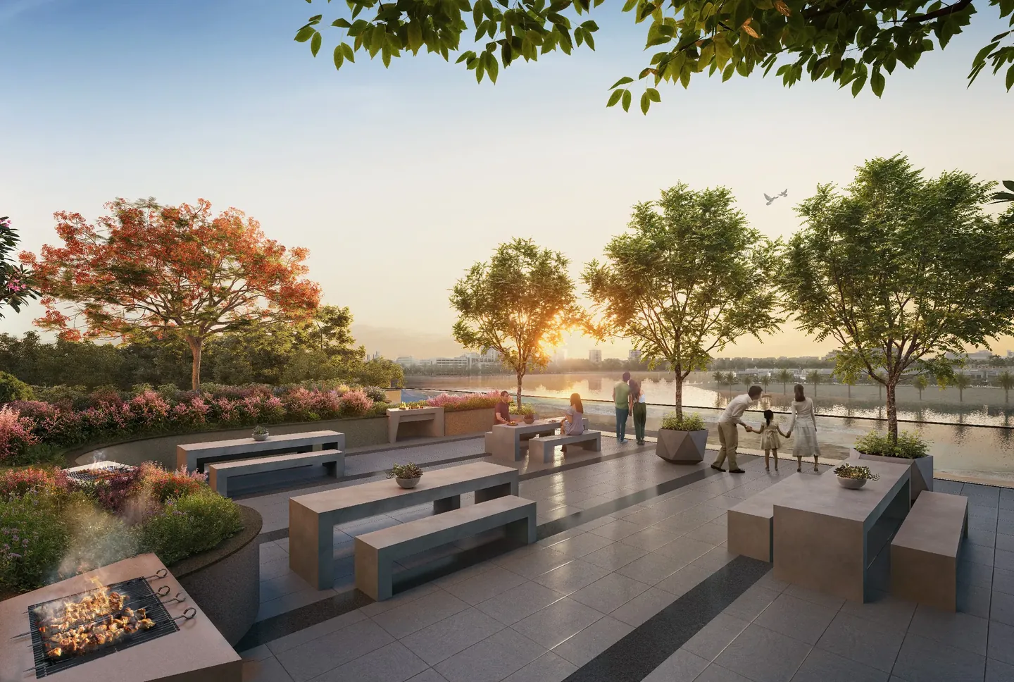 Al Hamra Waterfront: Outdoor lounge seating at sunset — developer rendering