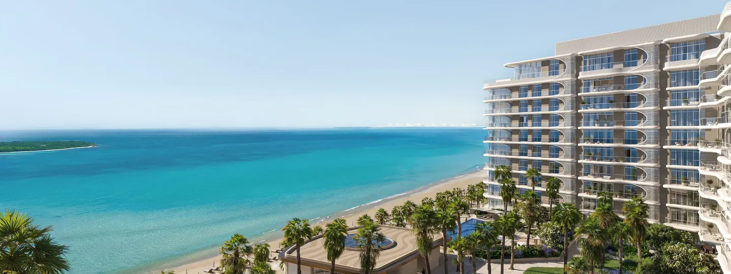 Fahid Beach Terraces: Beachfront tower and landscaped podium aerial — developer rendering