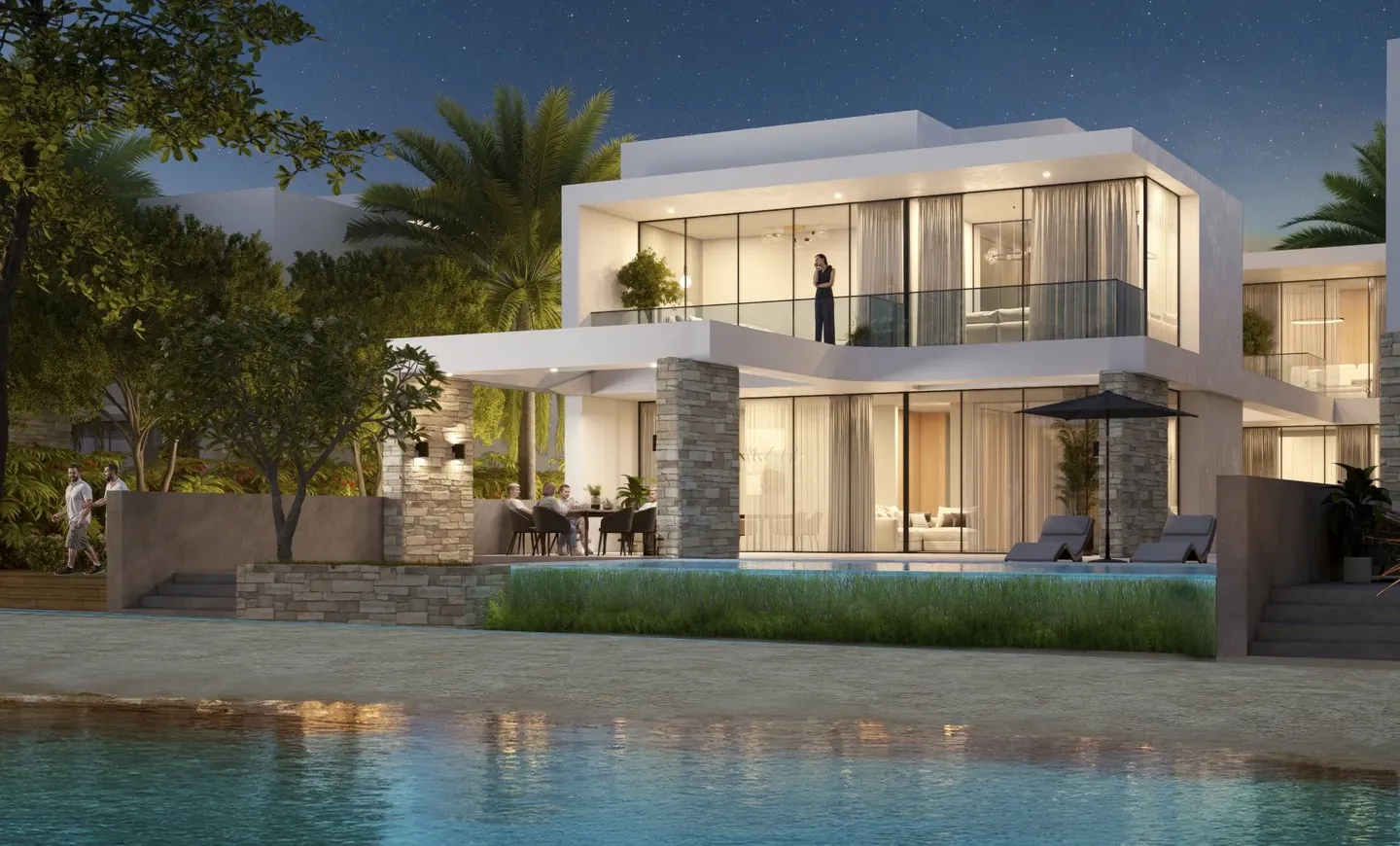 Palm Grove / Coral Beach Villas: Palm Grove villa at night — developer rendering