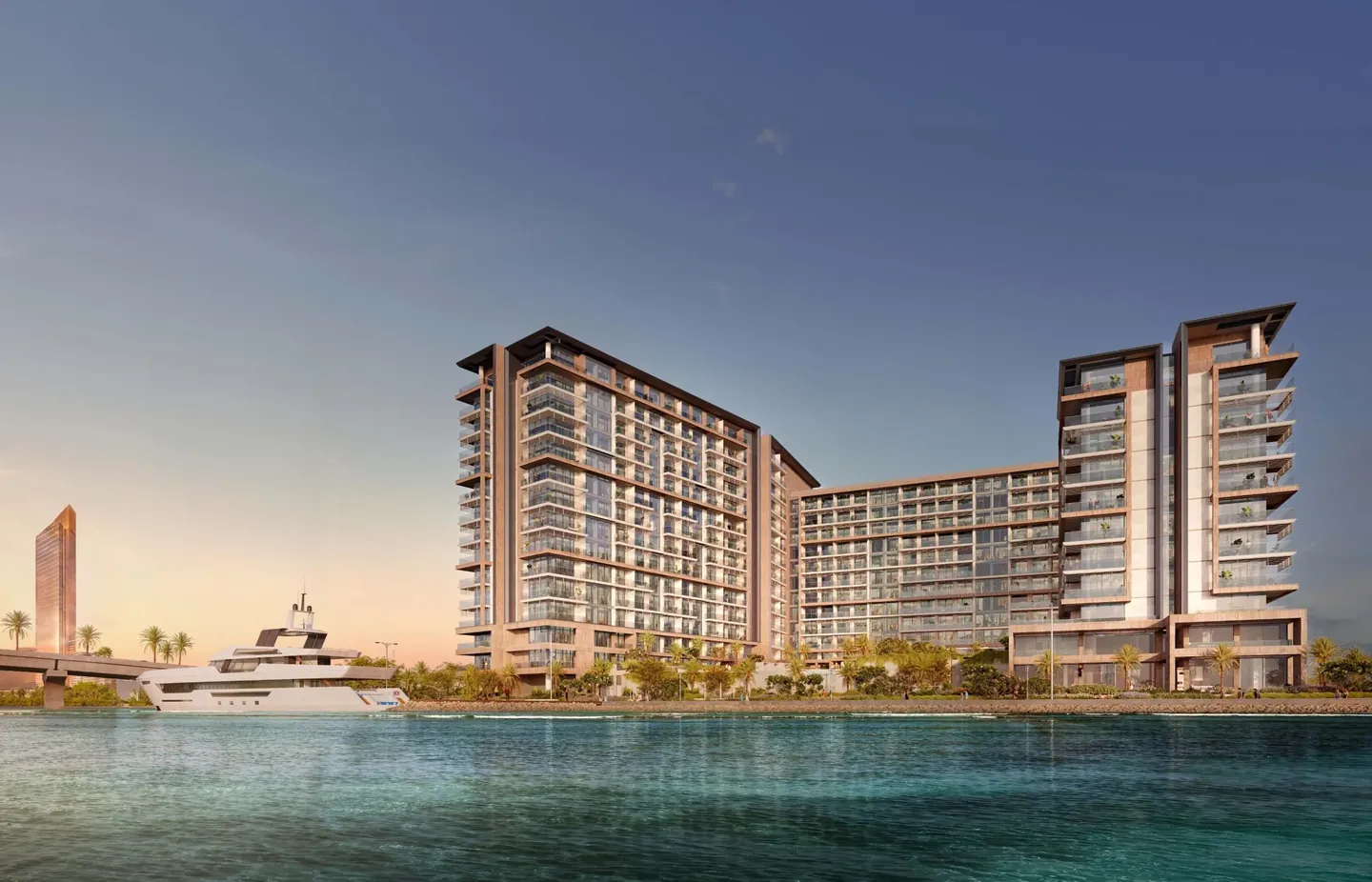 Playa del Sol: Waterfront exterior at dusk — developer rendering