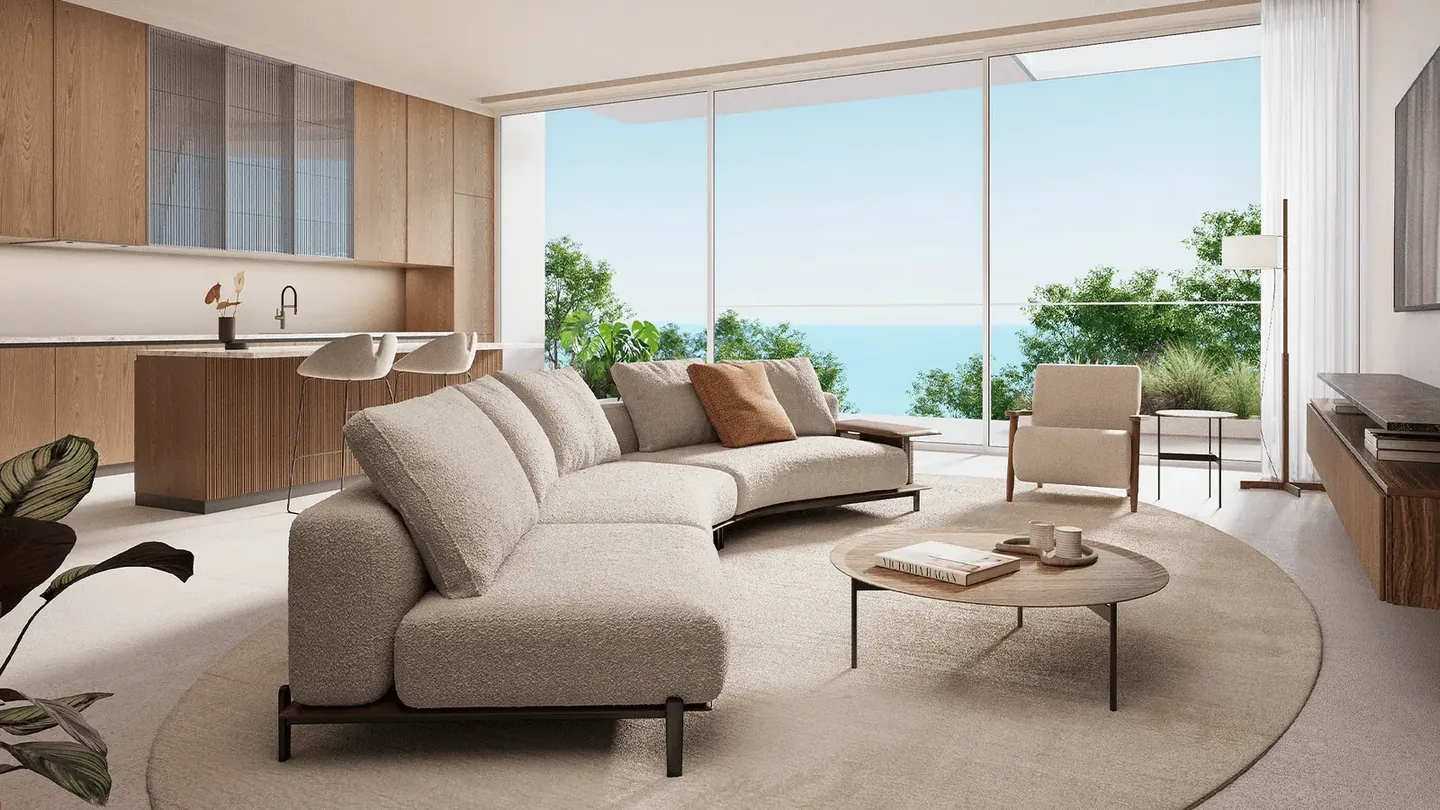 Sealine Residence: Apartment kitchen and curved sofa lounge — developer rendering